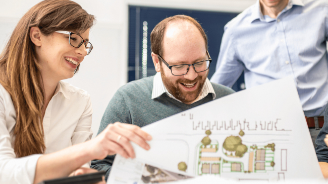 Man looking down and smiling