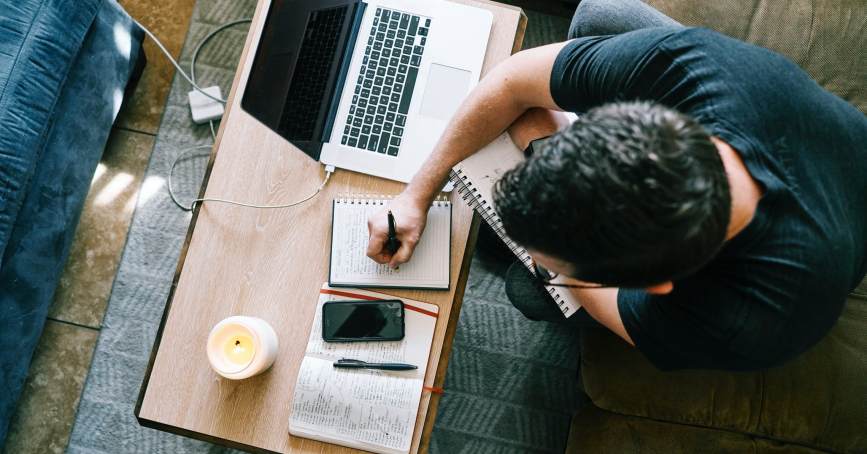 Taking notes in notebook